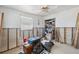 Renovation-ready bedroom featuring wall framing and a closet, offering a blank canvas for customization with natural light at 6521 Boatyard Dr, Hudson, FL 34667
