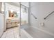 Bathroom featuring a tub and tiled floor at 6611 Ridge Crest Dr, Port Richey, FL 34668