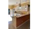 Functional kitchen with white appliances, ample counter space, and modern fixtures for convenient cooking at 7144 Gulf Breeze Cir, Hudson, FL 34667