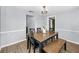The dining area includes a modern table and chairs at 7235 Astor Dr, New Port Richey, FL 34652