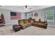 Spacious recreation room with comfortable seating, a television, and Ohio State décor at 7495 Birdland Cres, Spring Hill, FL 34607