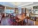 Formal dining area featuring an elegant chandelier and a large dining table at 75 N Canal Dr, Palm Harbor, FL 34684