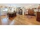 Traditional kitchen design with wooden floors, central island, and open floor plan at 75 N Canal Dr, Palm Harbor, FL 34684