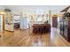 Spacious kitchen featuring an island with barstool seating and warm wooden floors at 75 N Canal Dr, Palm Harbor, FL 34684