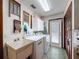 Functional laundry room featuring a sink, washer, dryer, and ample storage at 75 N Canal Dr, Palm Harbor, FL 34684