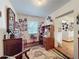 Cozy office space featuring built-in shelving and bright natural light from the window at 75 N Canal Dr, Palm Harbor, FL 34684