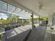 Backyard deck with pergola and water views at 75 N Canal Dr, Palm Harbor, FL 34684