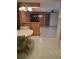 Well-lit dining area showcasing classic light fixtures and open layout at 7715 Gulf Highlands Dr, Port Richey, FL 34668