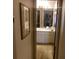 Bathroom view showcasing a vanity with double sinks, drawers, and lighting fixtures at 8008 La Serena Dr, Tampa, FL 33614