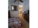 Bedroom showcasing a cozy quilt, ceiling fan, and dresser; bathroom is visible at 8008 La Serena Dr, Tampa, FL 33614