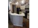 Functional kitchen featuring a breakfast bar, black appliances, and lots of counter space at 8008 La Serena Dr, Tampa, FL 33614