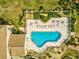 Aerial view of a community pool offering a spot for residents to relax and socialize at 8137 Morning View Dr, Hudson, FL 34667