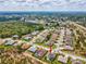 Aerial view of home in established neighborhood, community features highlighted, green spaces and homes visible at 8137 Morning View Dr, Hudson, FL 34667