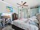 Serene bedroom featuring a king-size bed, ample closet space, and soothing decor at 8137 Morning View Dr, Hudson, FL 34667