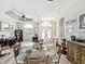 Foyer with high ceilings and an arched doorway, with dining and home office views at 8137 Morning View Dr, Hudson, FL 34667