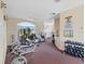 Bright fitness center offers free weights, recumbent bike, elliptical, and treadmill for residents at 8137 Morning View Dr, Hudson, FL 34667