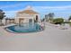 Community pool next to clubhouse offers refreshing relief, relaxation and a place to socialize at 8137 Morning View Dr, Hudson, FL 34667