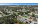 A high angle shot showing the home surrounded by a green, tranquil neighborhood at 8514 Ashbury Dr, Hudson, FL 34667