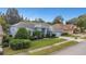 Charming single-story home with a well-manicured lawn, mature landscaping, and inviting curb appeal at 8514 Ashbury Dr, Hudson, FL 34667