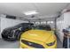 Spacious two car garage with ample storage and pristine epoxy floors at 8514 Ashbury Dr, Hudson, FL 34667