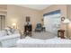 Cozy living room featuring a decorative fireplace and comfortable seating at 8514 Ashbury Dr, Hudson, FL 34667