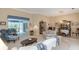 Inviting living room with ample seating, natural light, and open layout, perfect for entertaining or relaxing at 8514 Ashbury Dr, Hudson, FL 34667