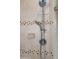 Shower details reveal a dual head shower with a stone tile surround at 8514 Ashbury Dr, Hudson, FL 34667