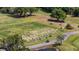 An aerial view of the community golf course showing the driving range at 888 Royal Birkdale Dr, Tarpon Springs, FL 34688