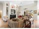 Cozy living room with fireplace, built-in bookshelves, and comfortable seating, perfect for relaxing at 9010 Penelope Dr, Weeki Wachee, FL 34613