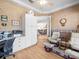 Well-lit home office with a ceiling fan and light colored walls at 9010 Penelope Dr, Weeki Wachee, FL 34613