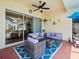 Covered patio with wicker furniture and a view of the pool at 9010 Penelope Dr, Weeki Wachee, FL 34613