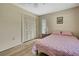 Bedroom featuring natural light, a ceiling fan, and closet at 9088 Gallup Cir, Spring Hill, FL 34608