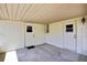 Enclosed garage space featuring two doors and ceiling, offering secure parking or storage at 9088 Gallup Cir, Spring Hill, FL 34608