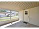 Screened patio overlooking green lawn, ideal for outdoor living and relaxation at 9088 Gallup Cir, Spring Hill, FL 34608