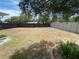 Large, fenced backyard, providing ample space and privacy for outdoor activities and landscaping opportunities at 9186 Patio Ct, Spring Hill, FL 34608