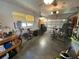Spacious garage with updated lighting, workbench, and plenty of room for storage and activities at 9186 Patio Ct, Spring Hill, FL 34608