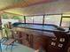 Above-ground pool featuring a built-in bar and backyard view at 9186 Patio Ct, Spring Hill, FL 34608