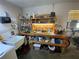 Functional workbench with ample storage and organization for tools and projects and utility sink at 9186 Patio Ct, Spring Hill, FL 34608