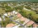 Wide aerial shot showcasing homes near a golf course and lush green spaces, community charm at 9355 French Quarters Cir, Weeki Wachee, FL 34613