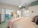 Spacious main bedroom features ensuite bath, and a sliding glass door leading to a lanai at 9355 French Quarters Cir, Weeki Wachee, FL 34613