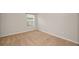 Bedroom with a window and carpet flooring at 10106 Tolman Dr, Hudson, FL 34667