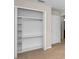 Spacious bedroom closet with built in shelving and plenty of space at 10106 Tolman Dr, Hudson, FL 34667