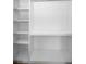 Spacious walk-in closet with adjustable shelving providing ample storage space at 10106 Tolman Dr, Hudson, FL 34667