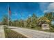 Briar Oaks community sign with well-maintained landscaping and an American flag at 10106 Tolman Dr, Hudson, FL 34667