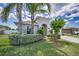 Charming single-story home with well-maintained landscaping and a welcoming entrance at 10106 Tolman Dr, Hudson, FL 34667