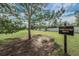 Protected gopher tortoise habitat features a burrow entrance near a gopher tortoise habitat sign at 10106 Tolman Dr, Hudson, FL 34667