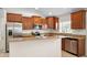 Kitchen with stainless steel appliances, granite countertops, and maple cabinets at 10106 Tolman Dr, Hudson, FL 34667