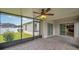 Relax on this screened-in patio with brick floors with easy access to the kitchen and backyard at 10106 Tolman Dr, Hudson, FL 34667