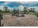 A well-maintained community playground with slides and climbing structures, perfect for Gathering fun at 10106 Tolman Dr, Hudson, FL 34667