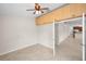 Versatile room with ceiling fan, built-in storage, offering flexible options for various uses at 10106 Tolman Dr, Hudson, FL 34667